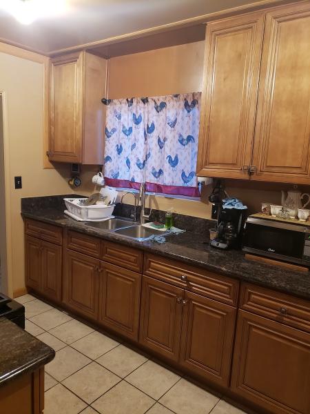Ozmart Kitchen Cabinets & Bath Remodeling