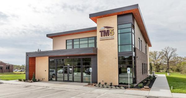 TM5 Team Brokered by EXP Realty