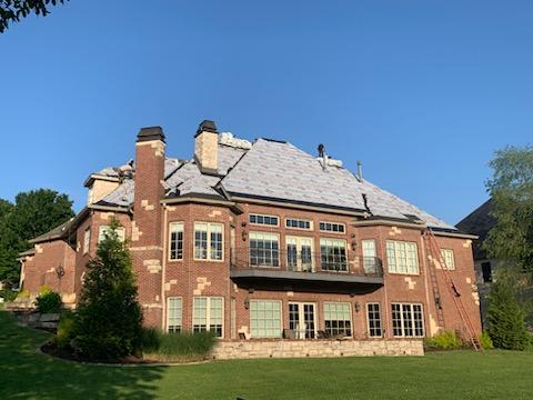 The Micham Roofing Company