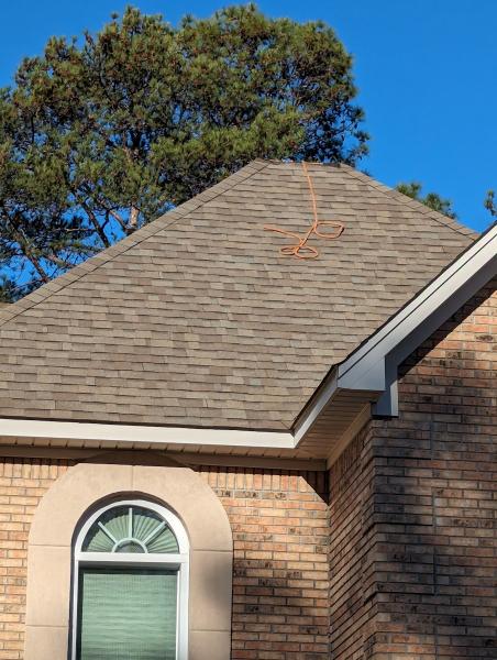 Romans Roofing Inc