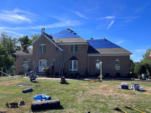 MCX Roofing LLC