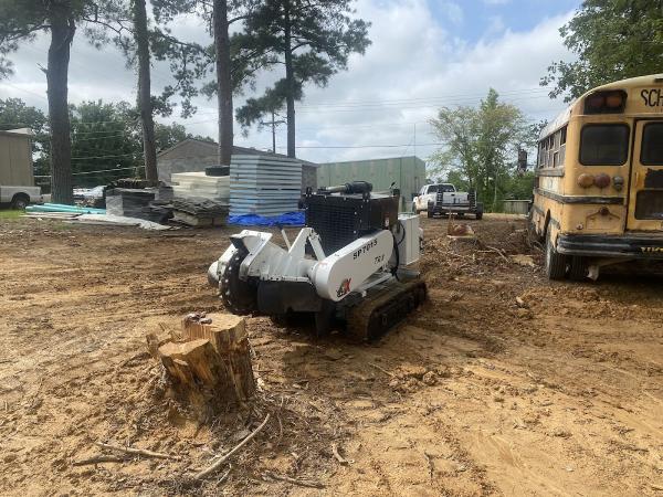 Stumpworks Stump Grinding & Asphalt Sealcoating + Line Striping