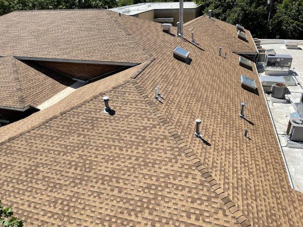 ARK Roofing Inc