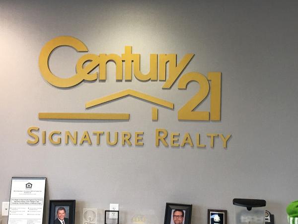 Century 21 Signature: Tom Webb