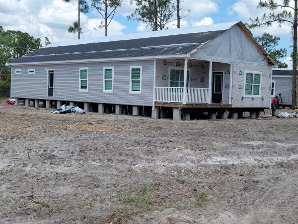 The Triplett Group Brokered by Passkey Realty