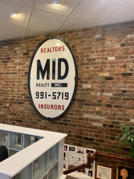 Mid Realty Inc.