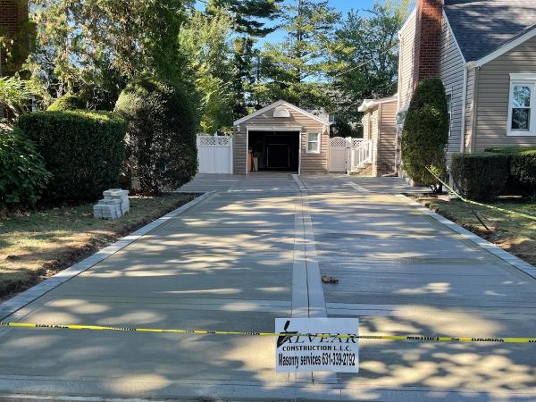 Alvear Construction Llc