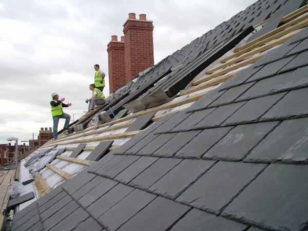 American Low Cost Roofing and Tuck Pointing