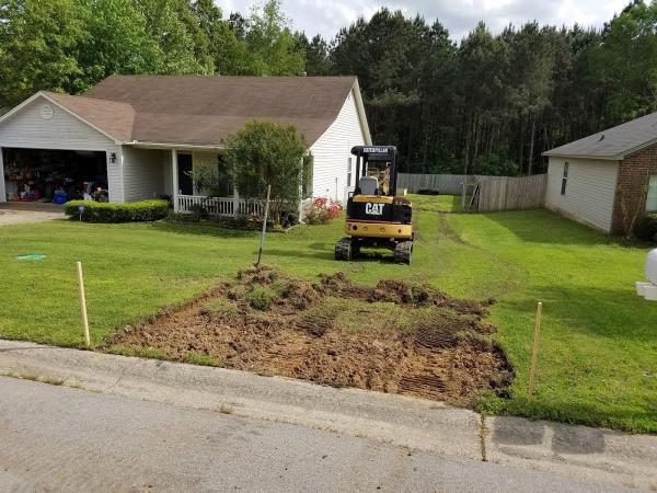 J E Benton Backhoe Service