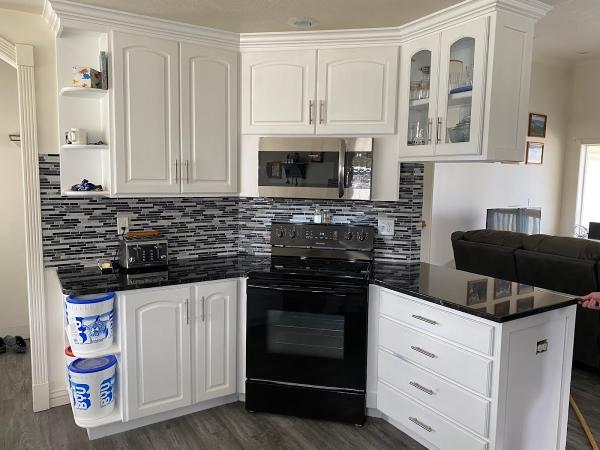 TL Flooring and Design by Tile Liquidators