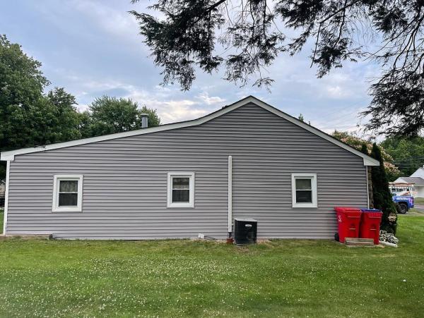 Magic Roofing & Siding Inc