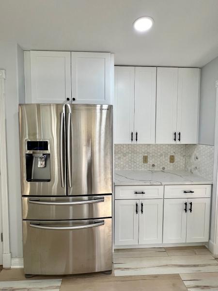 L. Phoenix Decor Flooring & Cabinet