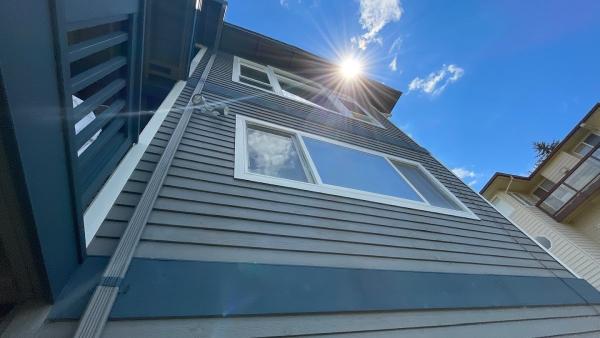 Johnny Tsunami Roof Cleaning