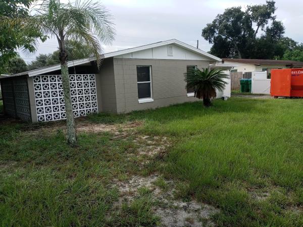 Woman With a Brush Painting Cleaning & Decorating Orlando