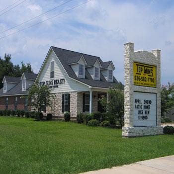 Topguns Realty