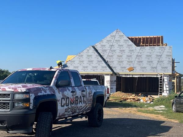 Combat Roofing & Restoration