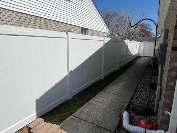 Custom Wood and Vinyl Fencing
